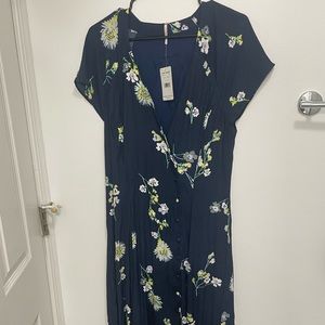 Free people Dress high low long button down the front. Size large. New